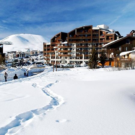 Résidence Odalys Le Christiana Alpe d'Huez Esterno foto